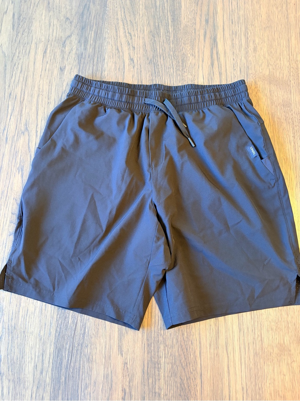 Men's UNRL stride shorts 

Size medium 
7.5” length 
Color: black